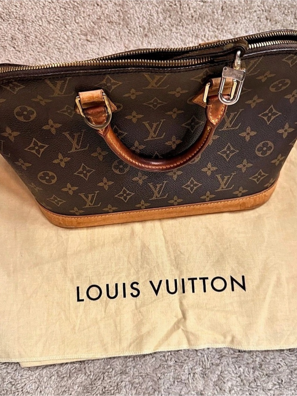 Louis Vuitton Alma PM Monogram Satchel Brown